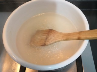 番茄丝瓜补钙粥,用铲子,搅拌均匀,再次煮开